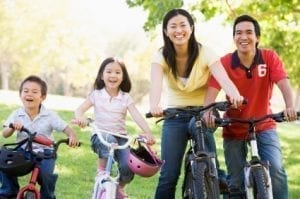 parents and kids biking
