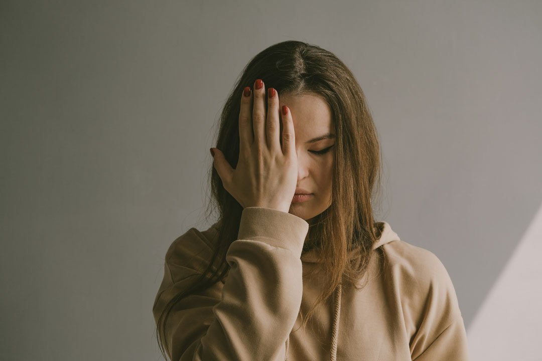 woman-stressed-closed-eyes-valeriia-miller-usplash